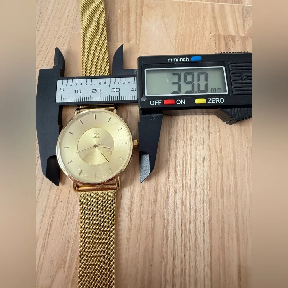 SK shengke ladies gold tone dress watch NEW BATTERY